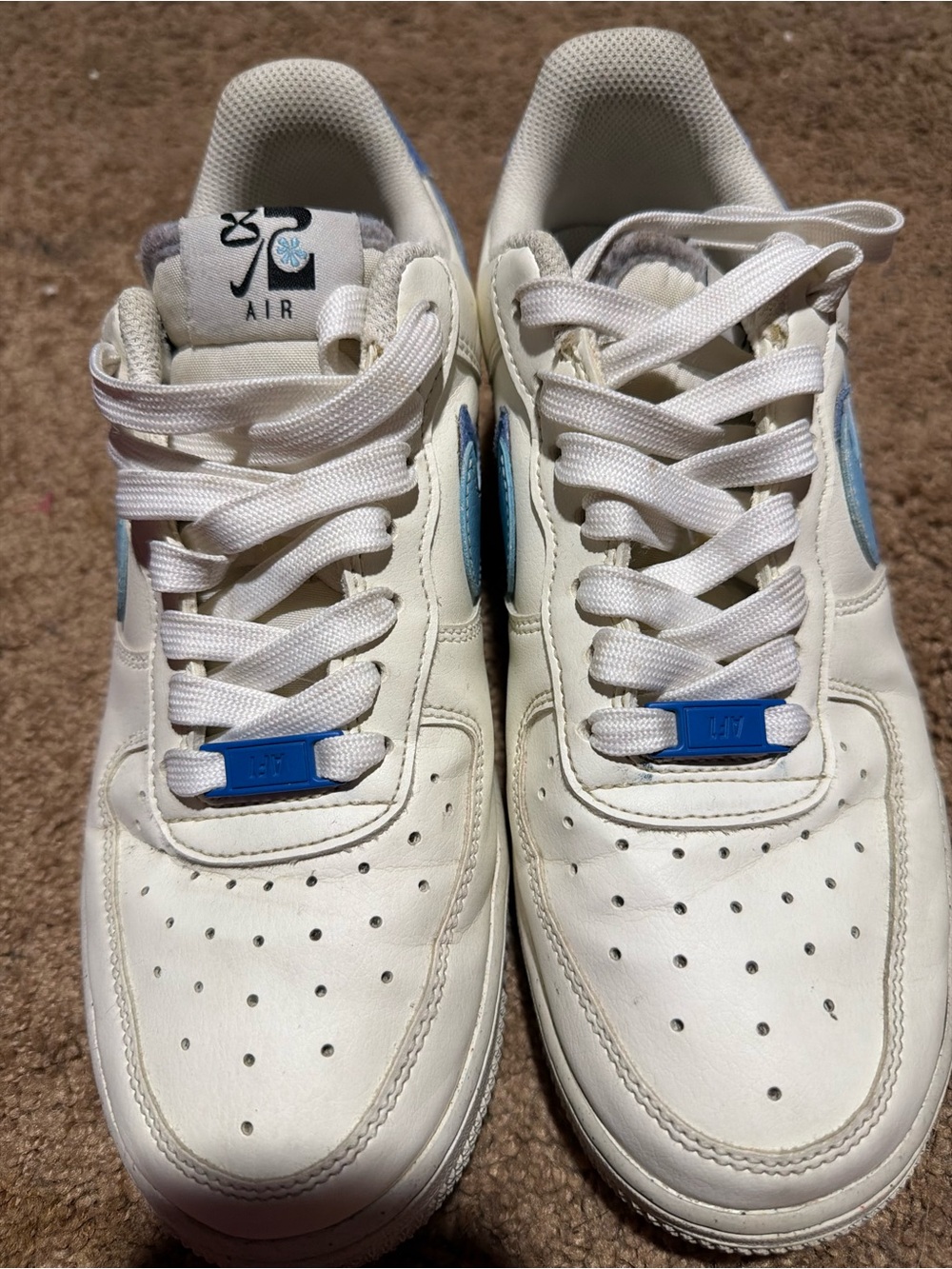 Nike White Leather Sneakers with Light Blue Accents